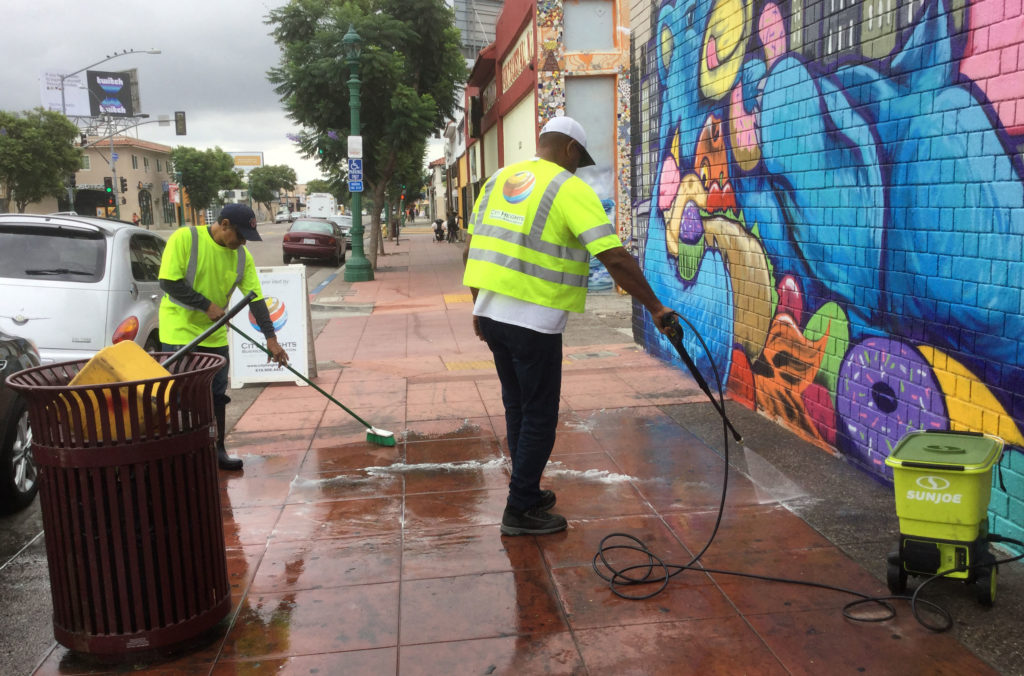 City Heights Business Association In-House Clean & Safe Staff at work cleaning up graffiti