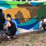 Artists working on the Teralta Park Unity in Community Mural